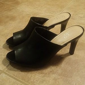Franco Sarto open toe heeled mules.